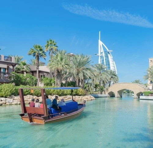 abra boat ride in madinat jumeirah with burj al arab view dubai
