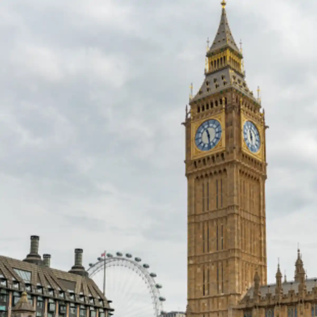 Big Ben clock tower and London skyline with London Eye in background