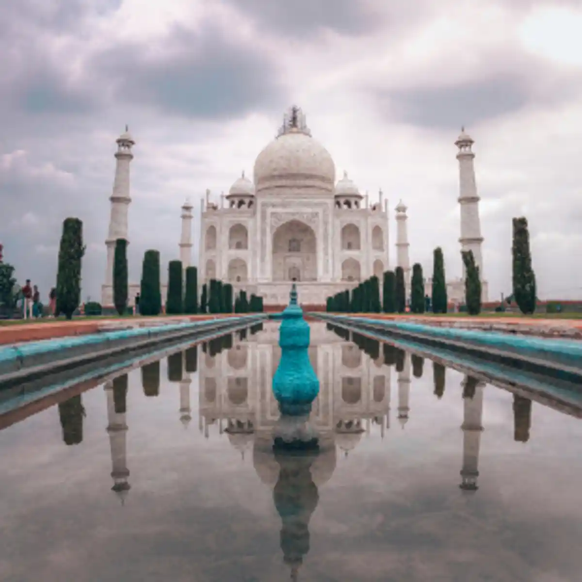 Taj Mahal with reflection in water and garden pathway