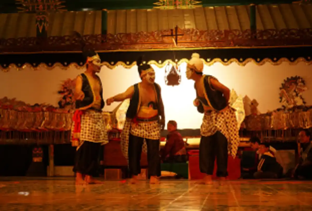 Traditional cultural dance performance on stage with costumes
