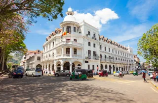 Historic white colonial building and street scene in Colombo Sri Lanka