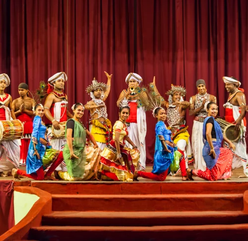 Traditional Kandyan dance performance on stage in Sri Lanka