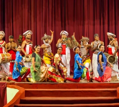 Traditional Kandyan dance performance on stage in Sri Lanka